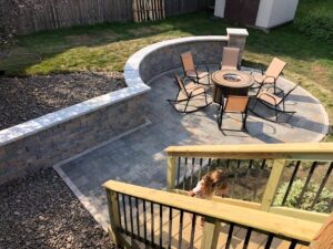 Make your backyard look beautiful with the retaining wall and paver patio services